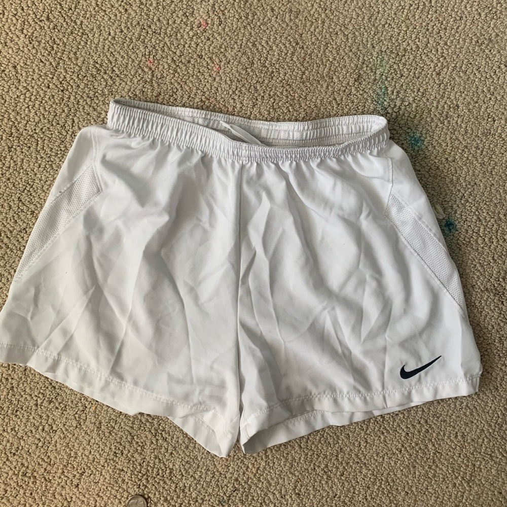 White Nike shorts